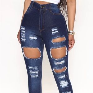 High waisted dark blue ripped jeans